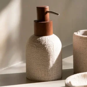 Dispensador de baño con textura